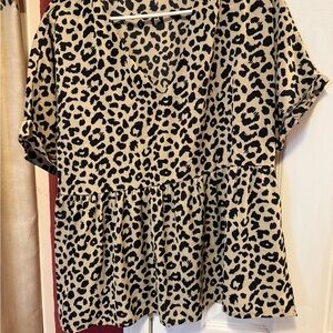 Chic Black and Tan Blouse with Elegant Design